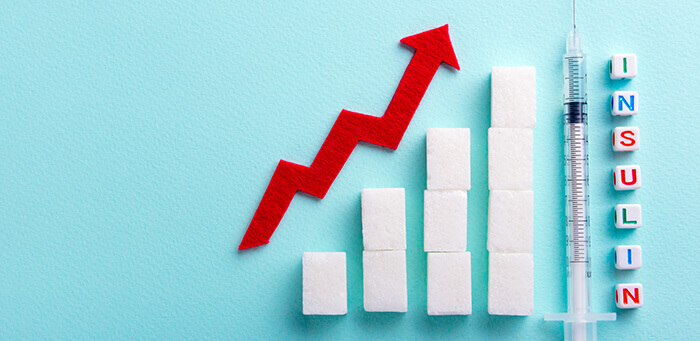 carrés de sucre représentant une augmentation de la glycémie