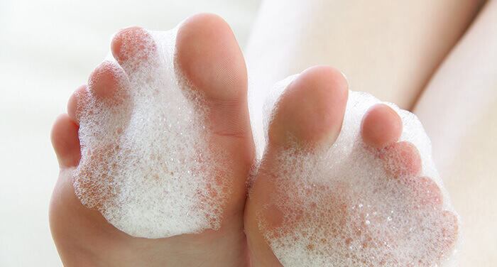 Pieds recouverts de gel moussant