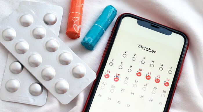 calendrier de suivi du cycle menstruel sur une application mobile