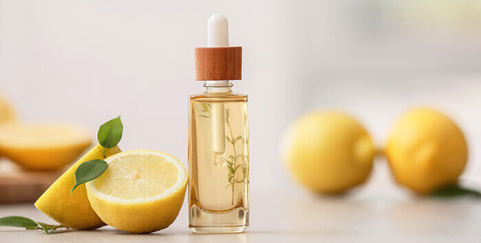 flacon d'huile essentielle de citron en guise d'actif minceur